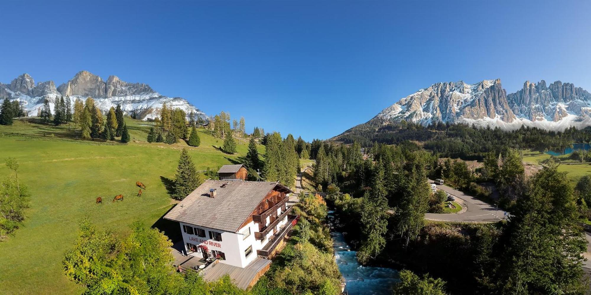 Lake & River Hotel Carezza al Lago Exteriör bild